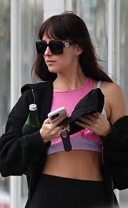Dakota Johnson in a Pink Top