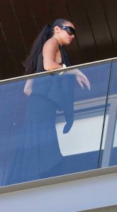 Dua Lipa in a Black Ensemble