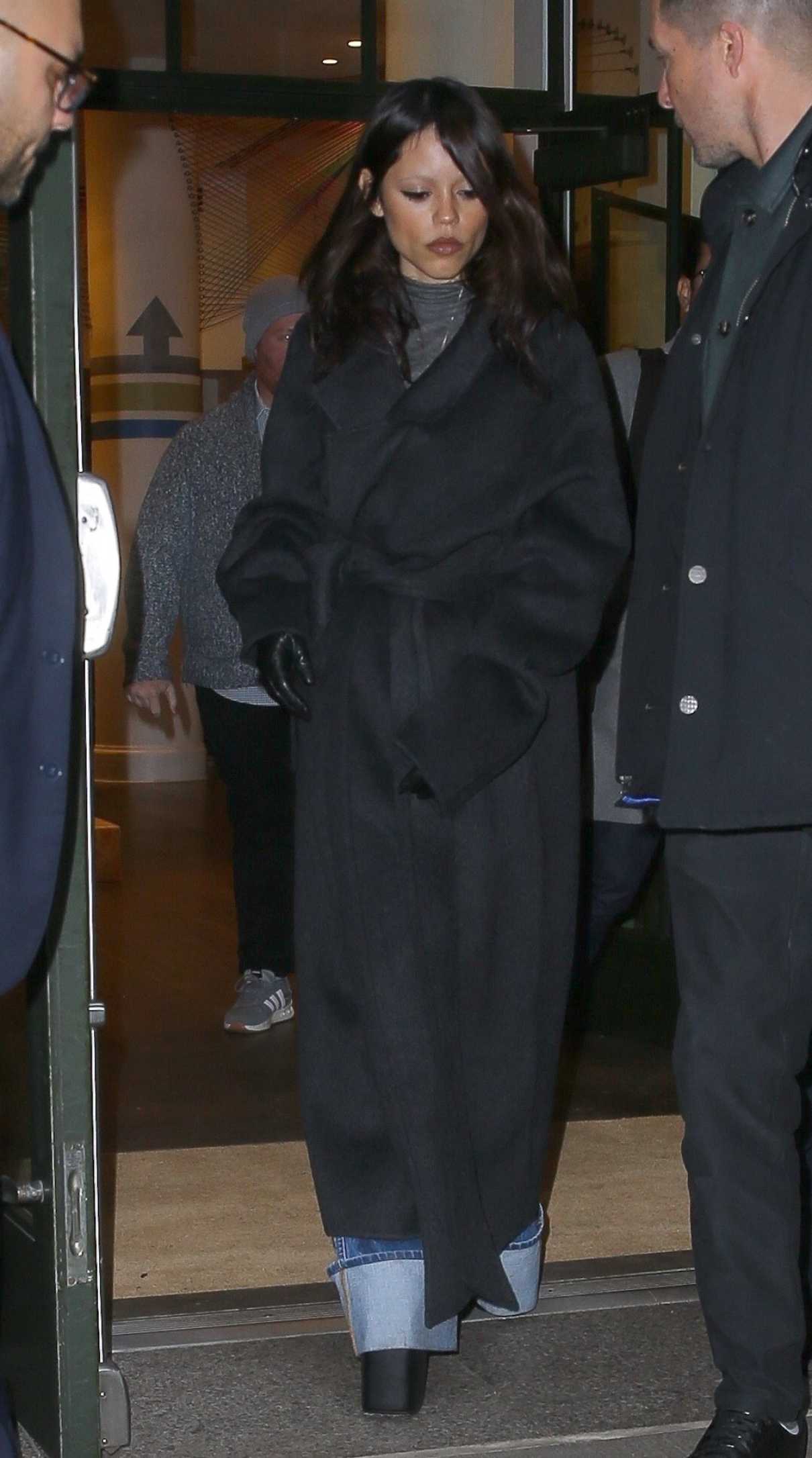 Jenna Ortega in a Black Coat