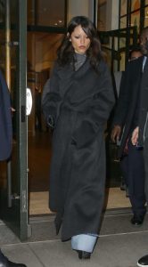 Jenna Ortega in a Black Coat