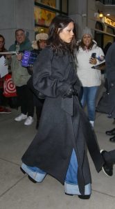Jenna Ortega in a Black Coat