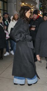 Jenna Ortega in a Black Coat
