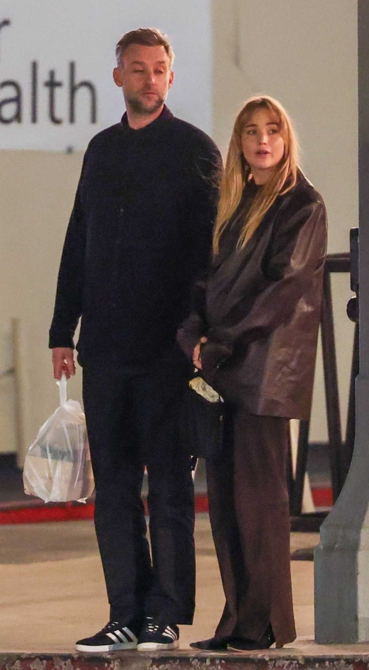 Jennifer Lawrence in a Brown Leather Blazer