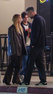 Jennifer Lawrence in a Brown Leather Blazer