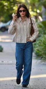 Lucy Hale in a Beige Striped Shirt