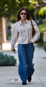 Lucy Hale in a Beige Striped Shirt