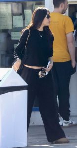 Madison Beer in a Black Sweatsuit