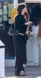 Madison Beer in a Black Sweatsuit