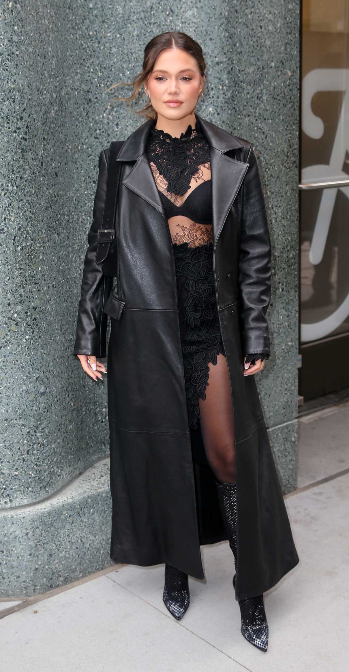 Olivia Holt in a Black Leather Coat