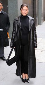 Olivia Holt in a Black Leather Coat