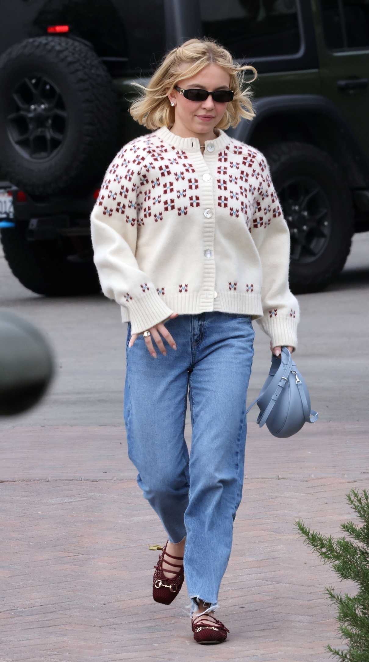 Sydney Sweeney in a White Cardigan