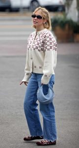 Sydney Sweeney in a White Cardigan
