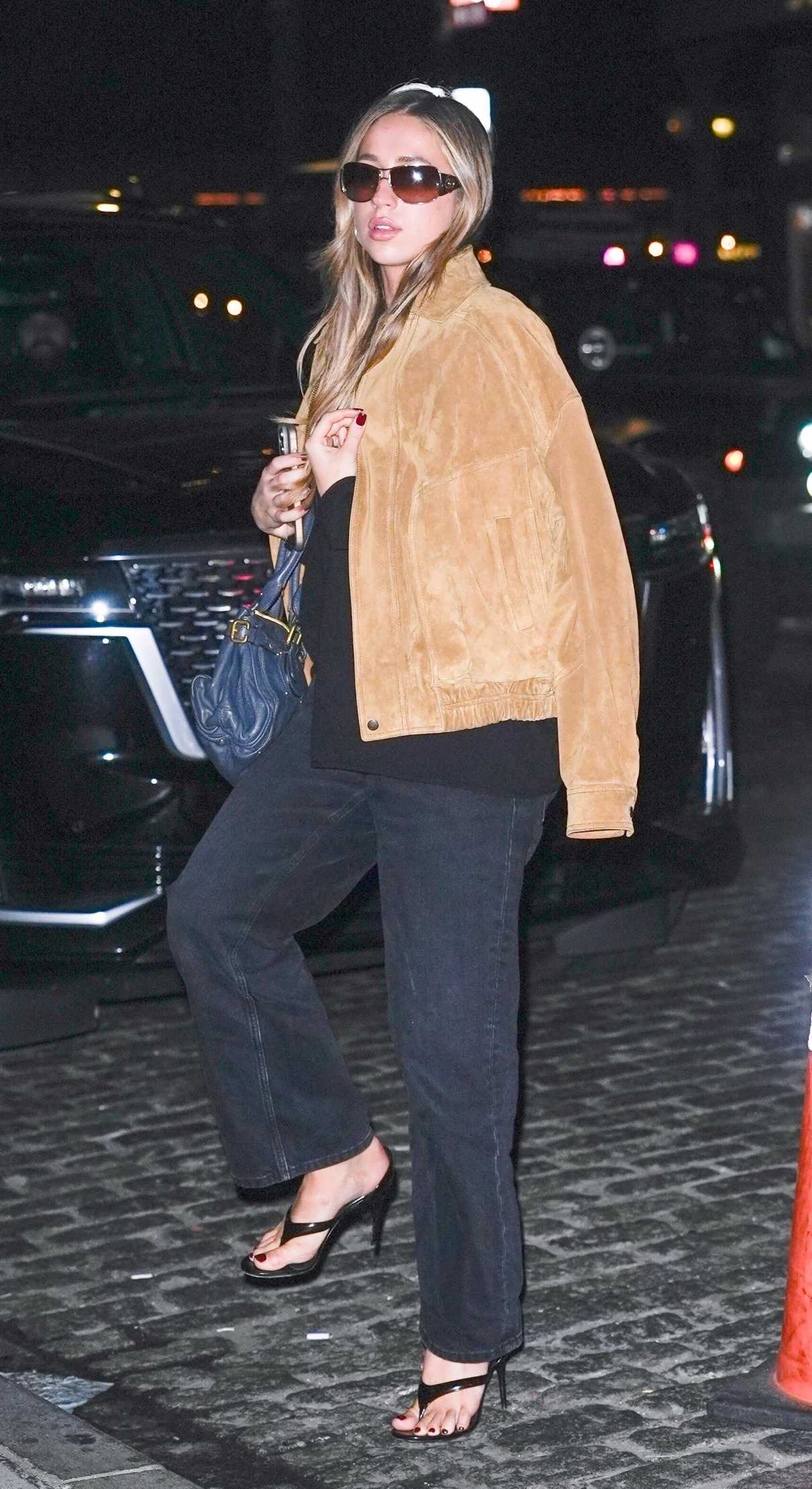 Tate McRae in a Beige Jacket