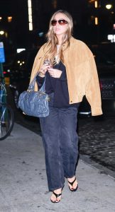 Tate McRae in a Beige Jacket