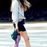 Alison Brie in a Black Spandex Shorts Stops to Chat with a Friend in Los Angeles 12/05/2025