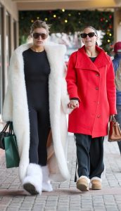 Brooks Nader in a White Fur Coat