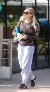Hilary Duff in a Black Adidas Sneakers