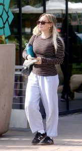 Hilary Duff in a Black Adidas Sneakers