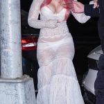 Ice Spice in a White See-Through Lace Dress Arrives at Paramount Pictures Screening Room in New York 12/19/2025