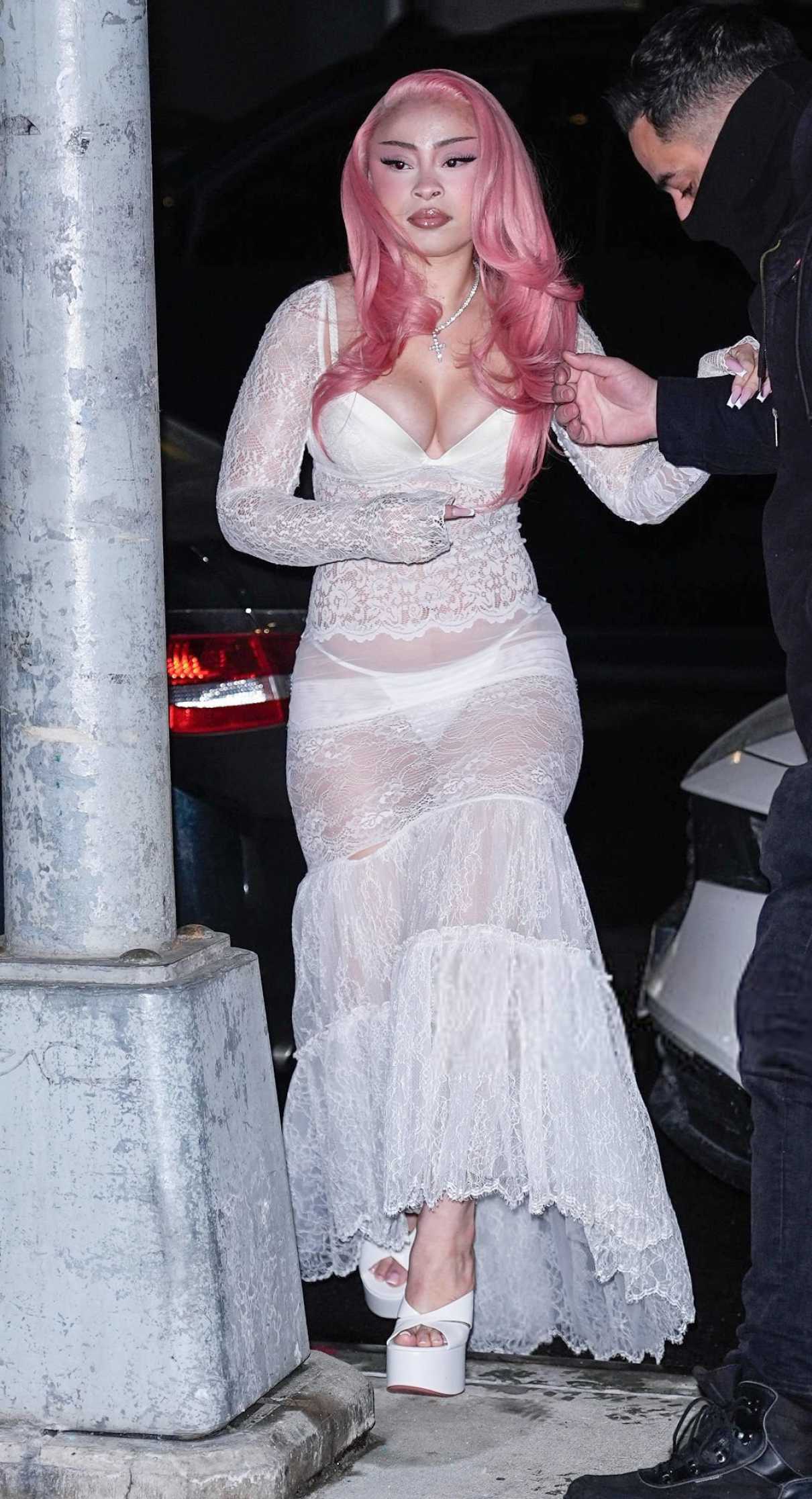 Ice Spice in a White See-Through Lace Dress