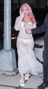 Ice Spice in a White See-Through Lace Dress