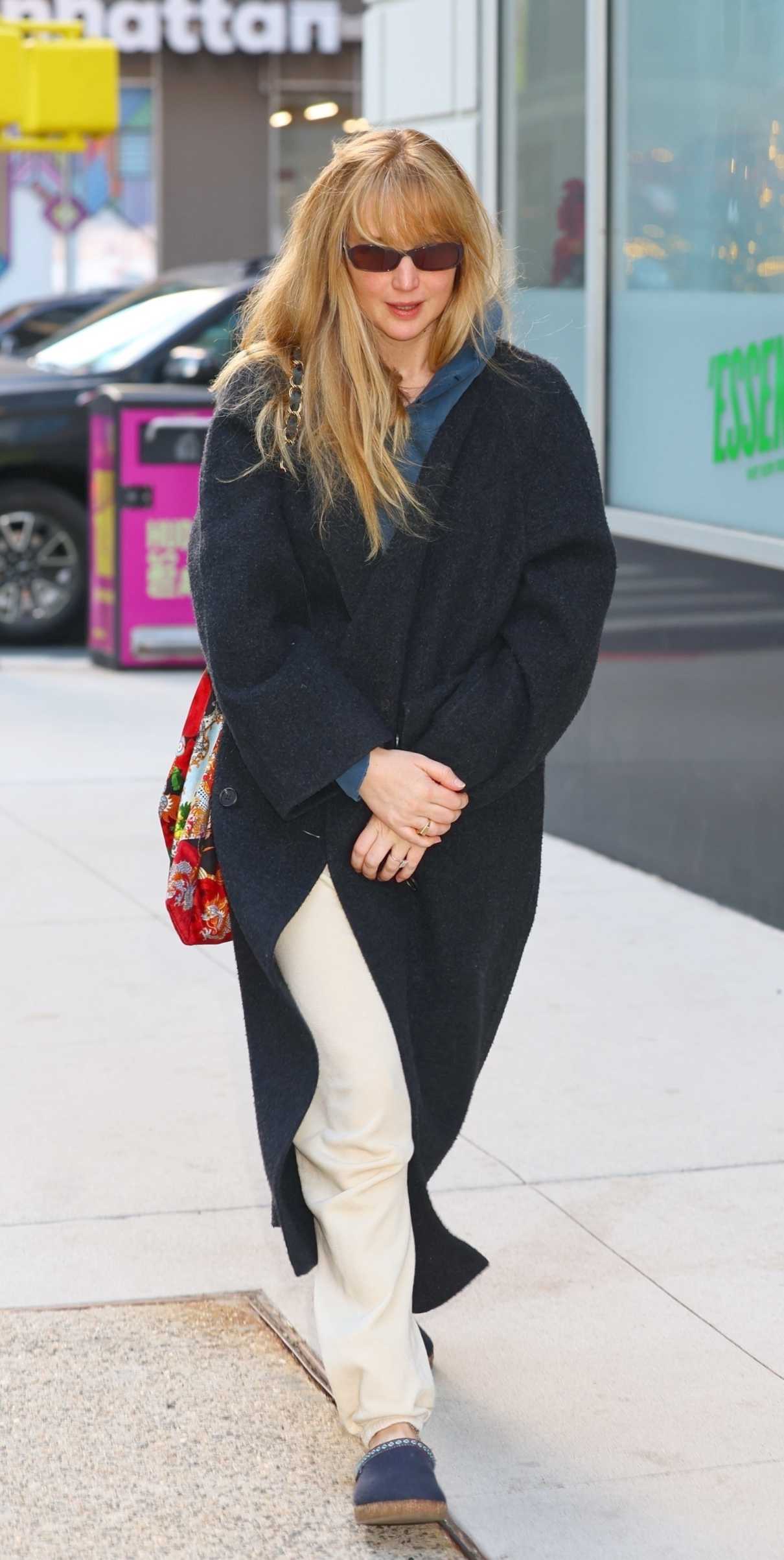 Jennifer Lawrence in a Black Coat