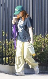 Joey King in a Green Cap