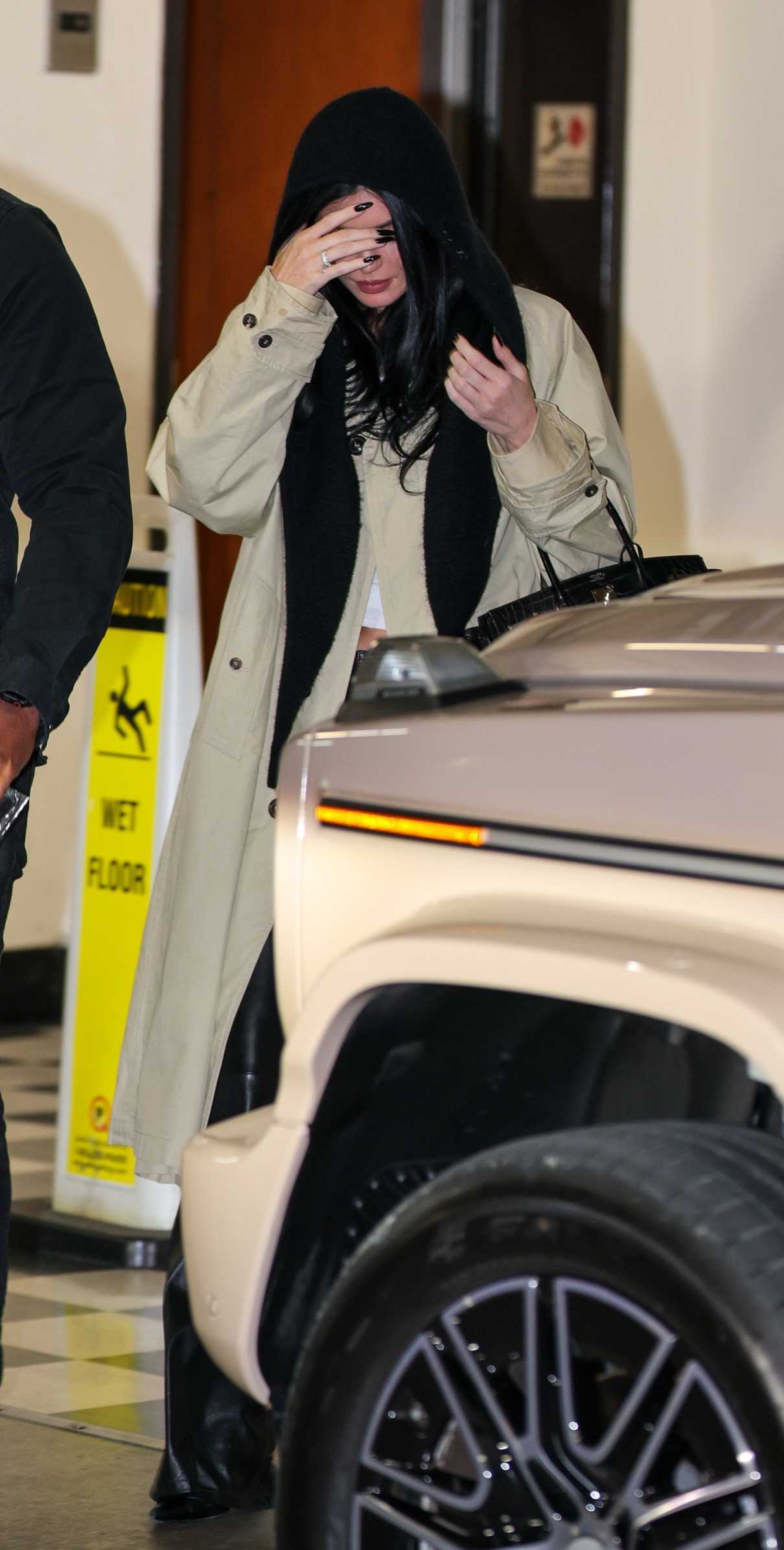 Kylie Jenner in a Beige Trench Coat