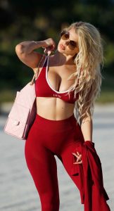 Luana Vjollca in a Red Workout Ensemble