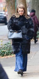 Olivia Jade in a Black Fur Coat