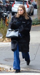 Olivia Jade in a Black Fur Coat