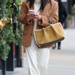 Shay Mitchell in a White Skirt Steps Out for Some Holiday Shopping in Aspen 12/18/2025