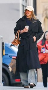 Tate McRae in a Black Trench Coat