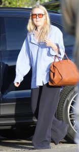 Dakota Fanning in a Black Pants