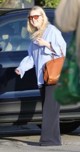 Dakota Fanning in a Black Pants