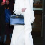 Emilia Clarke in a White Coat Was Seen Out in SoHo in New York City 01/13/2026