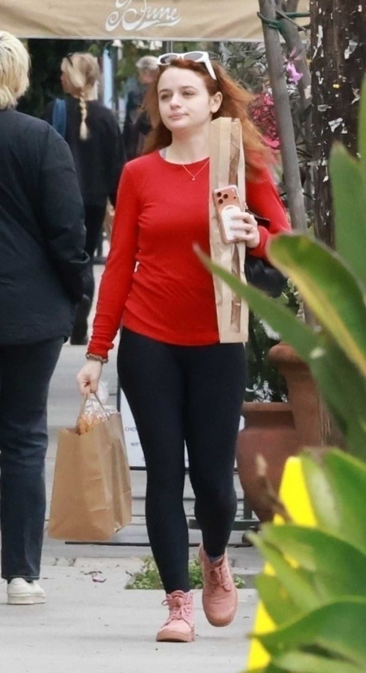 Joey King in a Red Long Sleeves T-Shirt