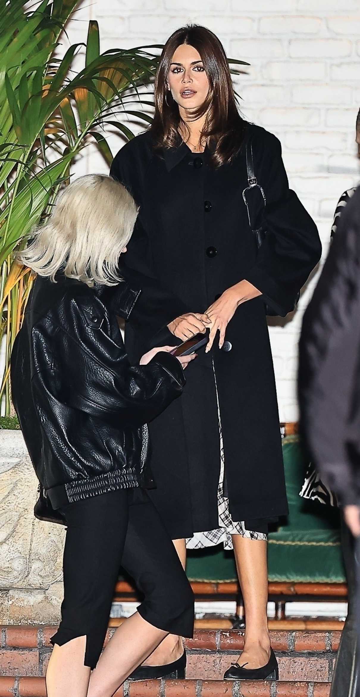 Kaia Gerber in a Black Coat