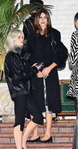 Kaia Gerber in a Black Coat