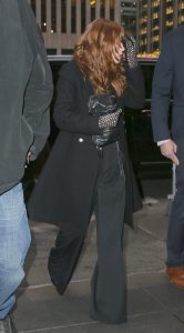 Sadie Sink in a Black Coat