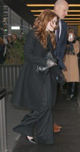 Sadie Sink in a Black Coat
