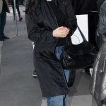 Charli D’Amelio in a Black Trench Coat Arrives at Her Hotel in Milan 02/25/2026