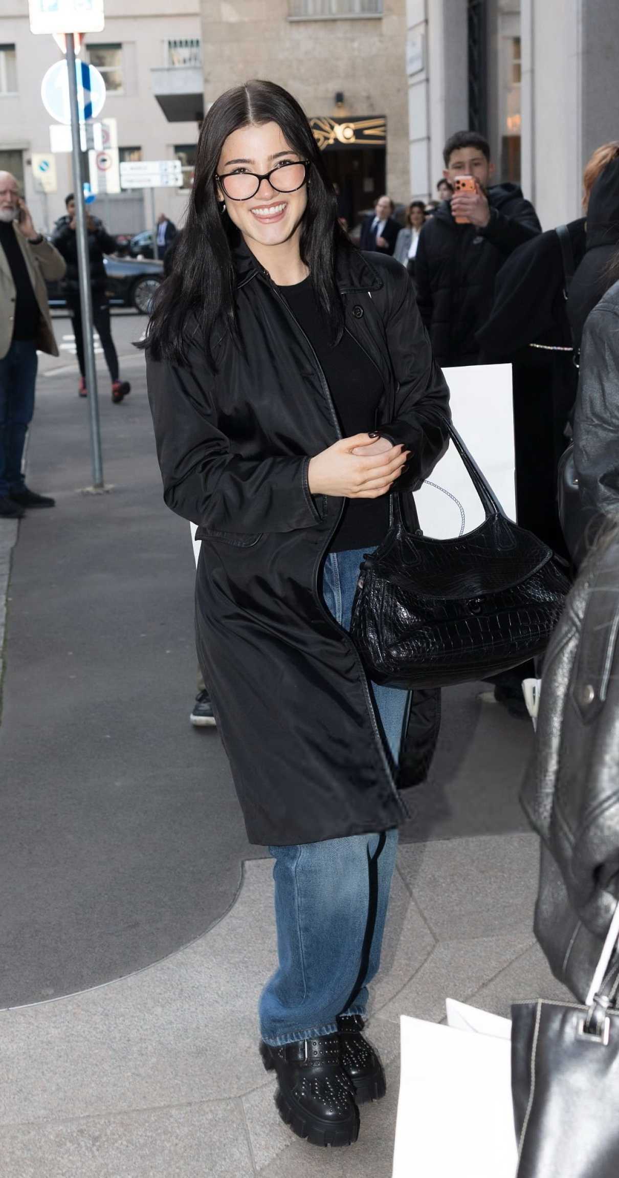 Charli D'Amelio in a Black Trench Coat