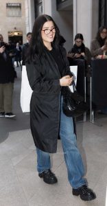 Charli D'Amelio in a Black Trench Coat