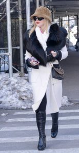 Kathryn Newton in a White Coat