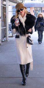 Kathryn Newton in a White Coat