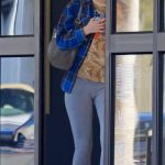 Lily-Rose Depp in a Blue Plaid Shirt Leaves an Office Building in Beverly Hills 02/03/2026