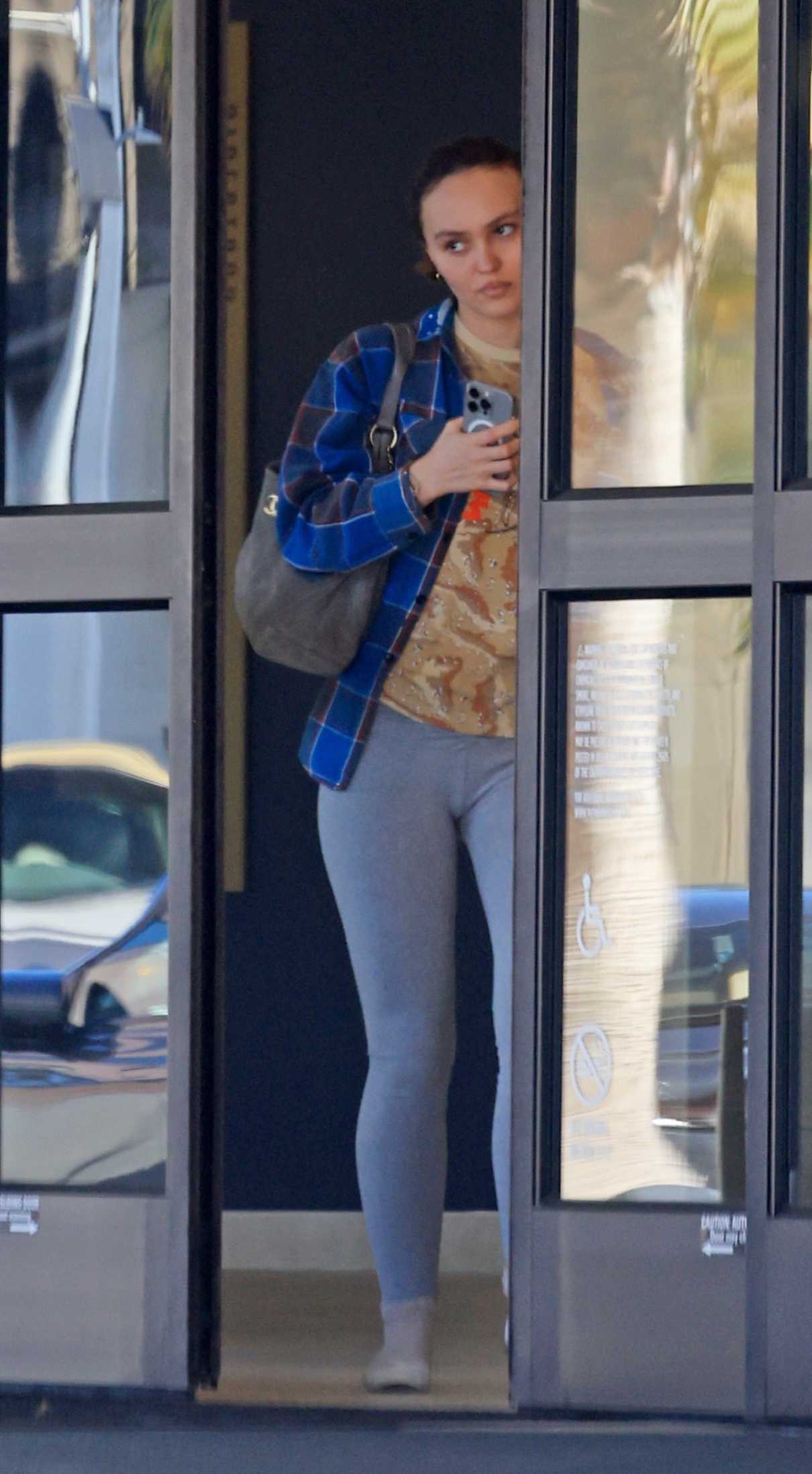 Lily-Rose Depp in a Blue Plaid Shirt