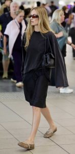 Margot Robbie in a Black Shorts