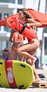 Hassie Harrison in a Red Swimsuit